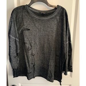 Distressed sweater with holes